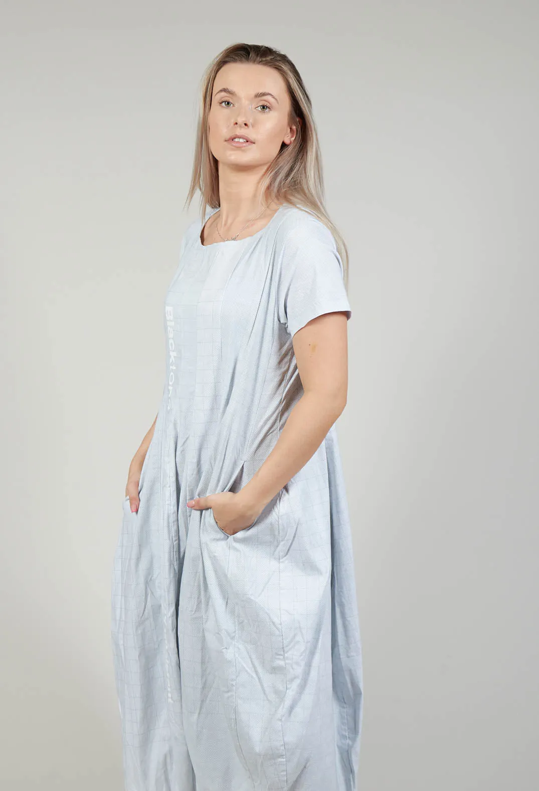 Short Sleeve Dress with Tulip Hem in Placed Grey Print